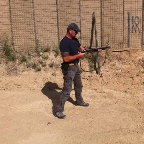 Standing at a perimeter wall on an outpost