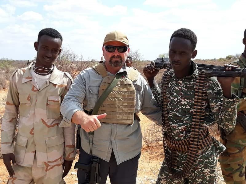 Standing with soldiers of a national security force